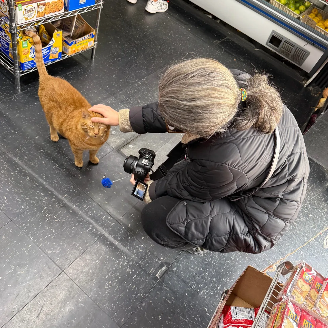 Dan Rimada interviewing bodega owner